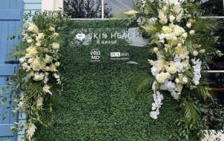 Corporate Event -Branded Activation -Hedge Wall Florals - Jewel of the South Skin Health Group Conference- French Quarter - New Orleans