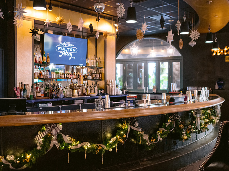 Fulton Alley - Corporate Event - Holiday Decor Design- Bar Garland Snowflakes